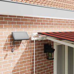 Berkfield Home Manual Retractable Awning with LED in Orange & Brown, 500x300 cm - thumbnail 4