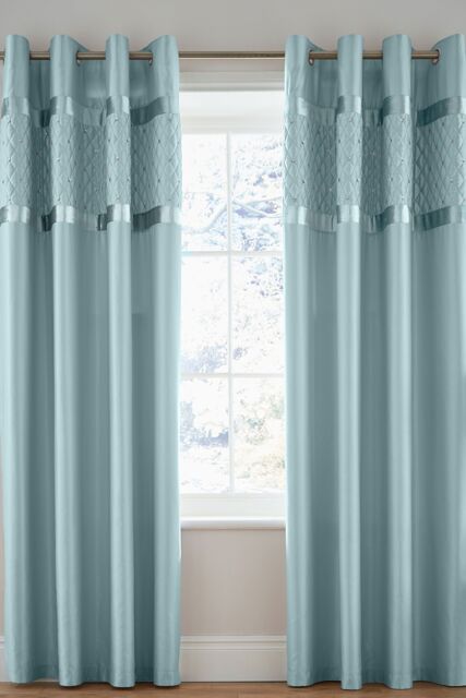 Catherine Lansfield 'Sequin Cluster' Lined Eyelet Curtains in Blue - Size: 168 cm width x 183 cm drop - image 1