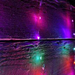 Samuel Alexander 1.2m x 1.2m Light up Snowflake Pin Wire Christmas Curtain Lights with 339 Rainbow LEDs - thumbnail 3