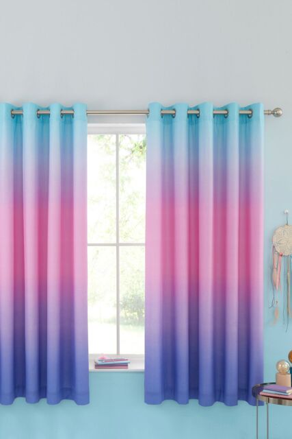 Catherine Lansfield 'Ombre Rainbow Clouds' Lined Eyelet Curtains in Blue - Size: 168 cm width x 183 cm drop - image 1