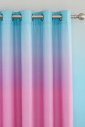 Catherine Lansfield 'Ombre Rainbow Clouds' Lined Eyelet Curtains in Blue - Size: 168 cm width x 183 cm drop - thumbnail 2