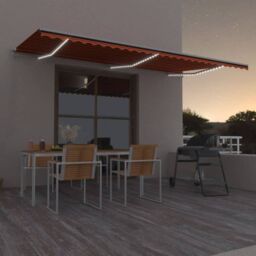 Berkfield Home Manual Retractable Awning with LED 600x300 cm Orange & Brown