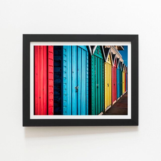 "Warren Reed - Designer Coloured Beach Huts Framed Art Print in Black - Size: W24"" x H36""" - image 1
