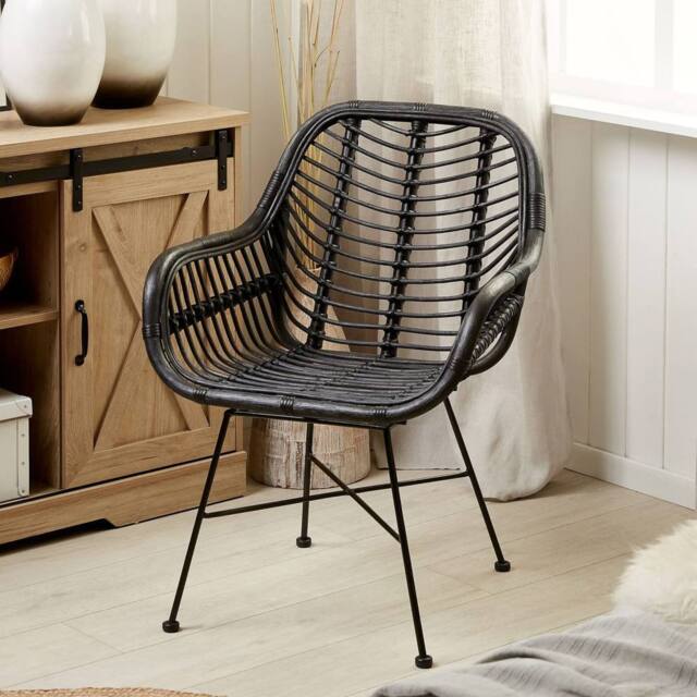 Wyld and Coco Black Rattan Armchair Wicker Detailing Black Metal Legs W64 x D62cm - image 1