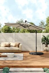 Living and Home Outdoor 32 LED Lighted Patio Umbrella with Crank Lift System, Cross Base & Fillable Base in Beige - thumbnail 1