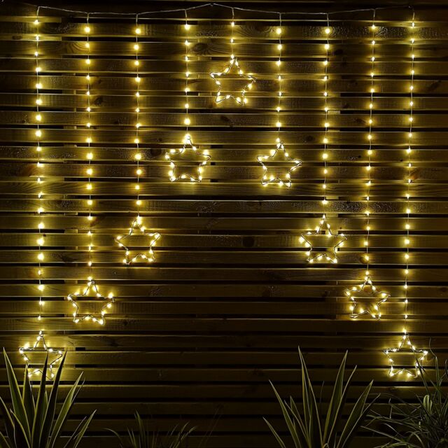 Samuel Alexander 1.2m Light up Star Curtain Christmas Lights with Warm White LEDs - image 1