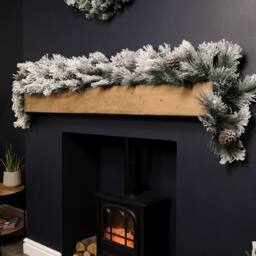 Samuel Alexander 6ft (1.8m) Premier Christmas Snow Flocked Green Garland with Pine Cones - thumbnail 3
