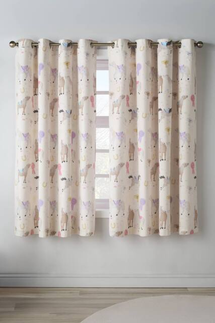Catherine Lansfield 'Happy Horses' Fully Reversible Eyelet Curtains in Cream - Size: 168 cm width x 183 cm drop - image 1
