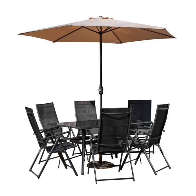 Samuel Alexander Outdoor 6 Person Glass Top Dining Table Chairs. Beige Parasol & Base in Black - image 1