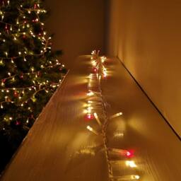 Samuel Alexander 1000 LED 25m Indoor Outdoor Christmas Multi Function Mains Operated String Lights with Timer & Clear Cable in Red & Vintage Gold