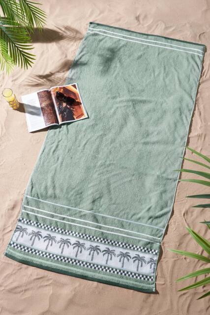 Catherine Lansfield 'Palm Trees' Cotton Extra Large Beach Towel in Green - image 1