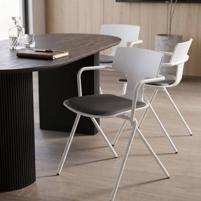Wyld and Coco Set of 2 Conference Chairs White Shell Black PU Cushion Metal Legs - image 1