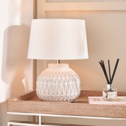 Ruma Small Bronze Textured Aztec Pattern Ceramic Table Lamp with Shade in White - thumbnail 1