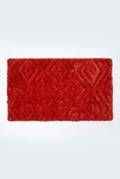 Homescapes Super Absorbent Ikat Pattern Bath Mat in Orange - thumbnail 1