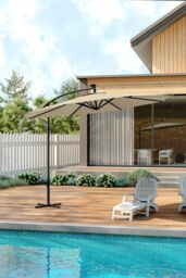 Living and Home Outdoor 32 LED Lighted Patio Umbrella with Crank Lift System with Base in Beige - thumbnail 1