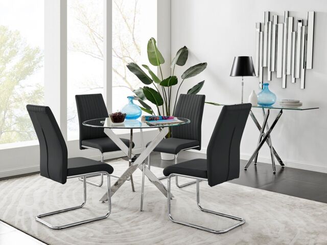 FurnitureboxUK Novara Clear Tempered Glass 100cm Round Dining Table with Chrome Starburst Legs & 4 Lorenzo Faux Leather Chairs in Black - image 1