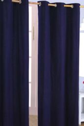 Homescapes Plain Cotton Ready Made Eyelet Curtain Pair in Navy - Size: 117 cm width x 137 cm drop - thumbnail 1