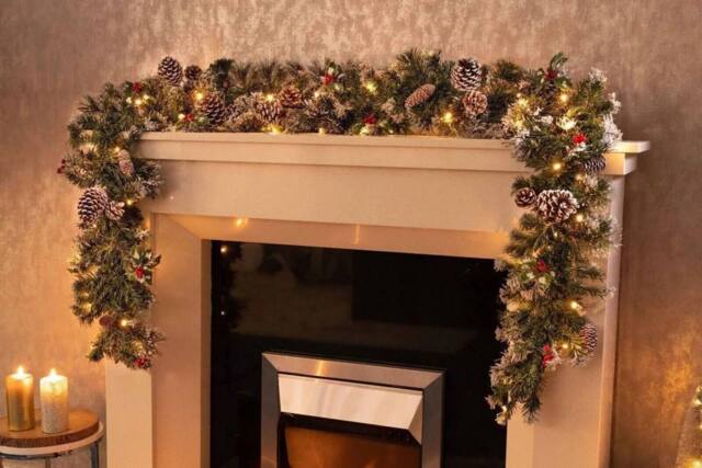 Marco Paul 6ft Pre-Lit Snow Dusted Christmas Garland in Green - image 1