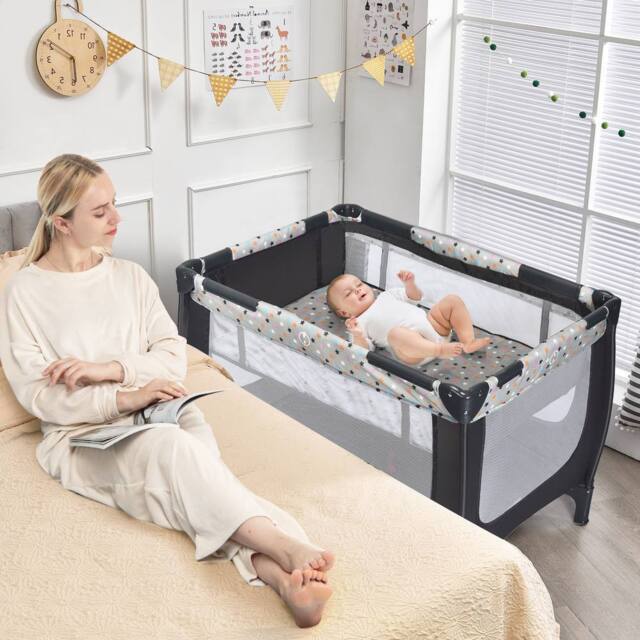 Costway 2-in-1 Baby Playpen Foldable Bassinet Bed Activity Center w/ Mattress - image 1