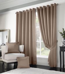 Luxury Living Adi Lined Ring Top Eyelet Curtains in Beige - Size: 168 cm width x 183 cm drop - thumbnail 1