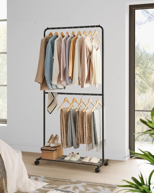 SONGMICS Rolling Clothes Rack with Middle Rod & Storage Shelf in Black - image 1
