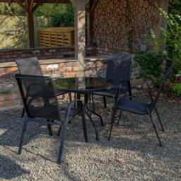Samuel Alexander Outdoor 4 Person Round Glass Top Garden Dining Table Chairs Set in Black - thumbnail 2