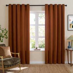 Furn Soft Chenille Blackout Eyelet Curtain Pair in Burnt Orange - Size: 168 cm width x 137 cm drop - thumbnail 2