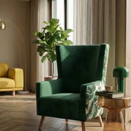 Wyld and Coco Wingback Armchair Deep Green Velvet High Back Slanted Light Wood Legs