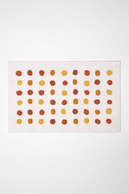 Homescapes 100% Cotton Bath Mat Tufted Polka Dot Design in Mustard - image 1