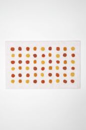 Homescapes 100% Cotton Bath Mat Tufted Polka Dot Design in Mustard - thumbnail 1