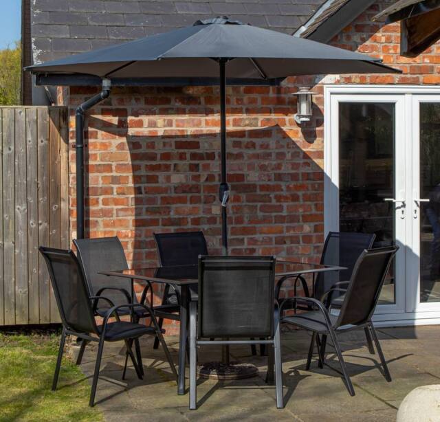 Samuel Alexander 6 Person Rectangular Glass Top Garden Dining Table Chairs With Beige Banana Parasol & Base in Grey - image 1