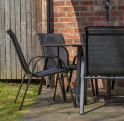 Samuel Alexander 6 Person Rectangular Glass Top Garden Dining Table Chairs With Beige Banana Parasol & Base in Grey - thumbnail 4