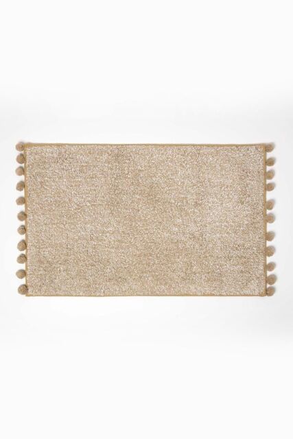 Homescapes Tufted Bath Mat 100% Cotton with Pom Pom Edges in Beige - image 1