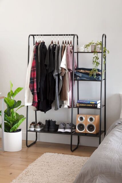 Living and Home Metal Freestanding Garment Rack With 4 Shelves in Black - image 1
