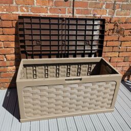 Samuel Alexander 335 Litre Rattan Style Garden Cushion Storage Box with Sit on Lid - Dark Brown - thumbnail 1