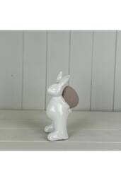 KDMD Whimsical Ceramic White Rabbit Holding an Egg - thumbnail 1