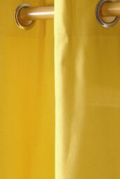 Homescapes Plain Cotton Ready Made Eyelet Curtain Pair in Yellow - Size: 140 cm width x 229 cm drop - thumbnail 2