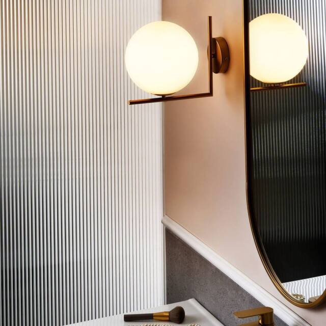 Wyld and Coco Gold Wall Lamp with Iron Base and Glass Shade - image 1