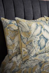 Edinburgh Weavers Tivoli Tropical Luxury Cotton Piped Pair of Pillowcases in Yellow - thumbnail 1