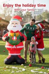 Living and Home 2.4m Lighted Christmas Inflatable Santa Holding Wreath Decoration in Red - thumbnail 3