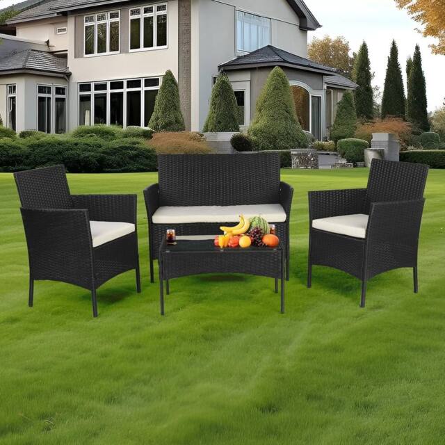 Lishetimig 4-Piece Rattan Garden Furniture Set with Glass Coffee Table & Cushions in Black - image 1