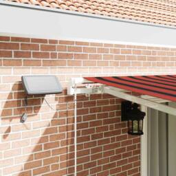 Berkfield Home Manual Retractable Awning with LED Orange & Brown 450x300 cm - thumbnail 4