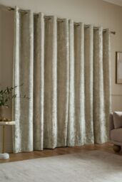 Catherine Lansfield 'Crushed Velvet' Lined Eyelet Curtains in Natural - Size: 168 cm width x 183 cm drop - thumbnail 2