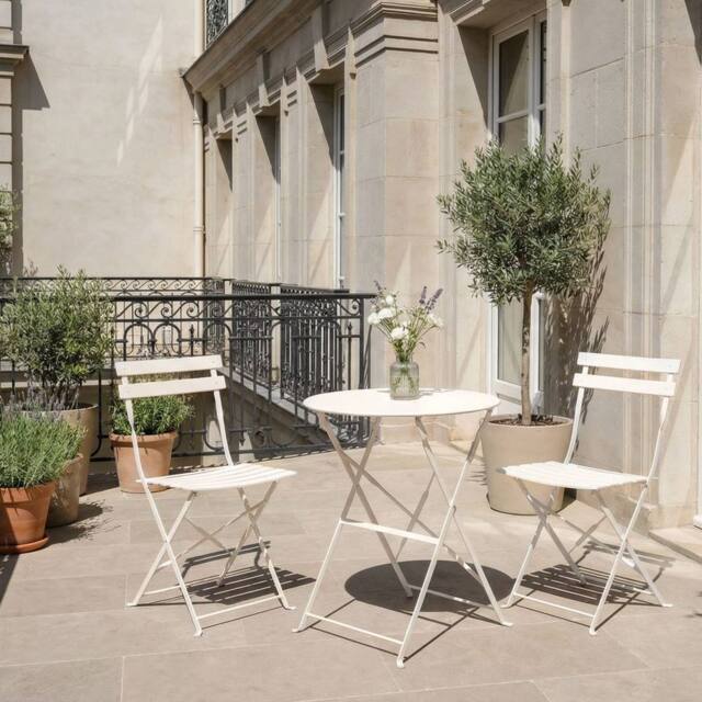 Wyld and Coco 3 Piece Off-White Metal Folding Bistro Set in White - image 1