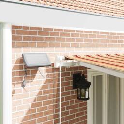 Berkfield Home Manual Retractable Awning with LED Yellow & Orange 600x350 cm - thumbnail 4