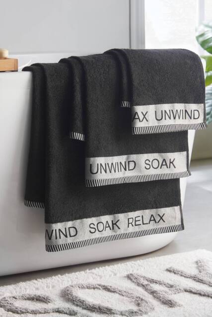 Catherine Lansfield 'Relax & Unwind' 4 Piece Towel Set in Black - image 1