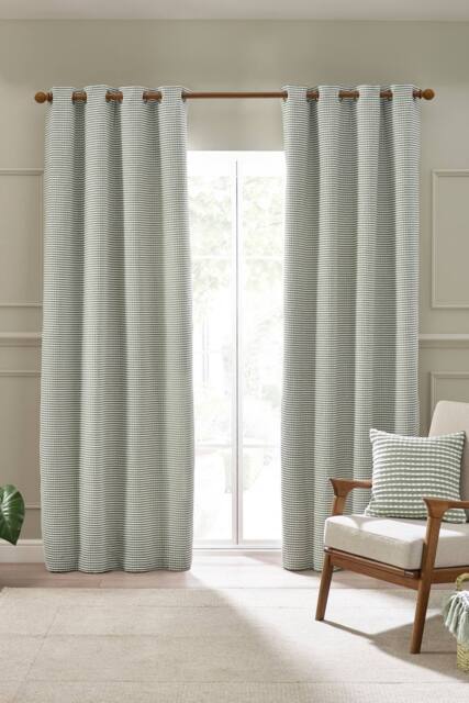 Catherine Lansfield 'Stab Stitch' Lined Eyelet Curtains in Green - Size: 168 cm width x 137 cm drop - image 1