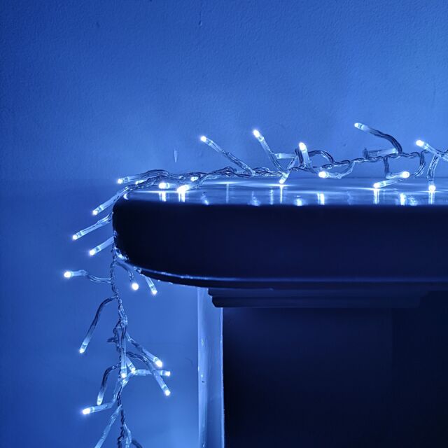 Samuel Alexander 960 LED 12m Premier Cluster Indoor Outdoor Multi Function Mains Operated Christmas Lights with Timer on Clear Cable in Cool White - image 1