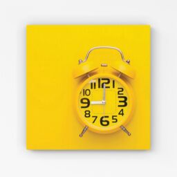 "Warren Reed - Designer Yellow Alarm Clock Canvas - Size: W16"" x H16""" - thumbnail 1