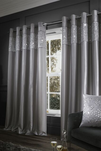 Catherine Lansfield 'Glitzy' Lined Eyelet Curtains Two Panels in Grey - Size: 168 cm width x 137 cm drop - image 1
